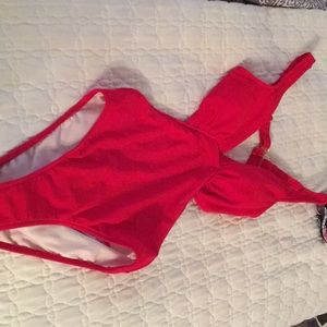 Red Venus suit never worn